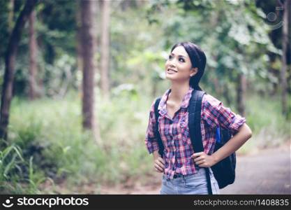 Young Women Hikers on Relax time on holiday concept travel in forest