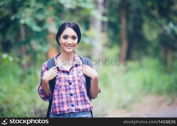 Young Women Hikers on Relax time on holiday concept travel in forest