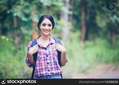 Young Women Hikers on Relax time on holiday concept travel in forest