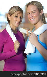 Young Women Holding Towels After Exercising