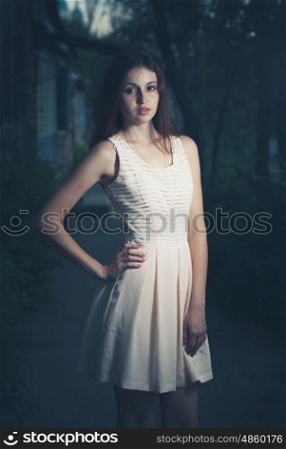 Young women in dress old photo stylized. Loneliness concept