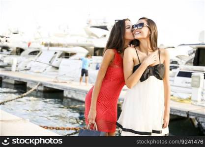 Young women in the marina