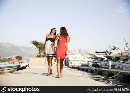 Young women in the marina