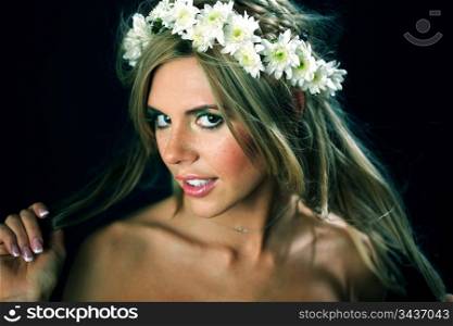young women on black flowers in hair
