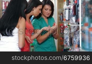 Young Women Shopping in Cosmetics Store
