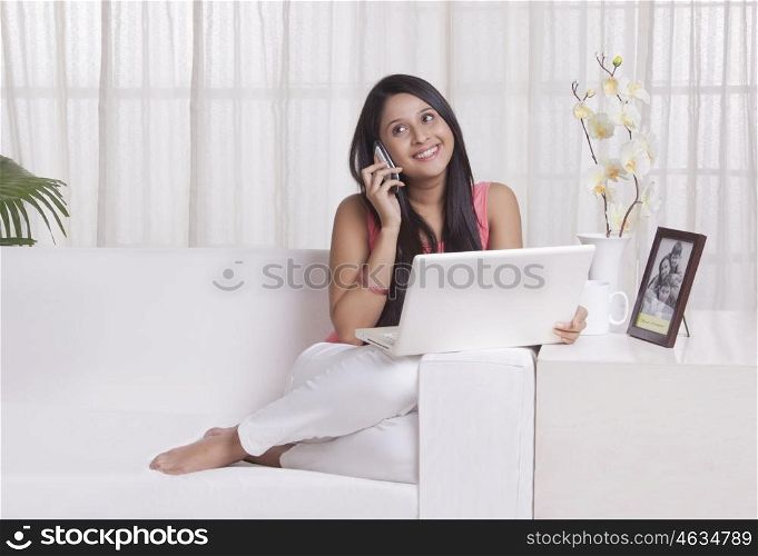 Young WOMEN talking on her cell phone