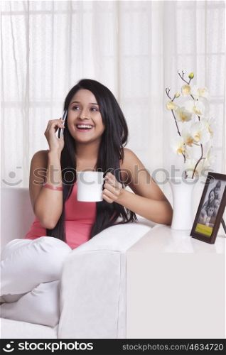 Young WOMEN talking on mobile phone