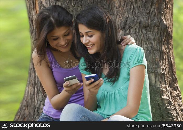 Young women using cell phone