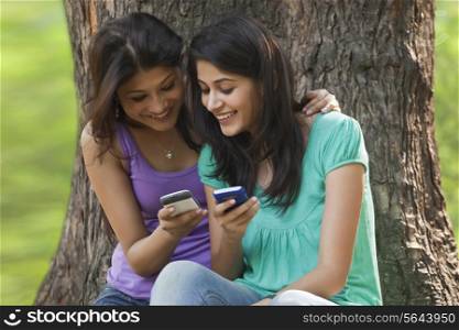 Young women using cell phone