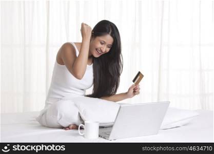 Young WOMEN using credit card