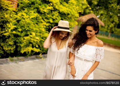 Young women walking in the park
