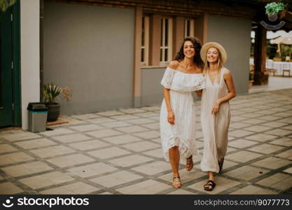 Young women walking in the resort