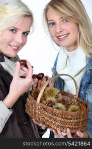 Young women with a basket of chestnuts