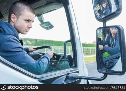young worker driving a truck