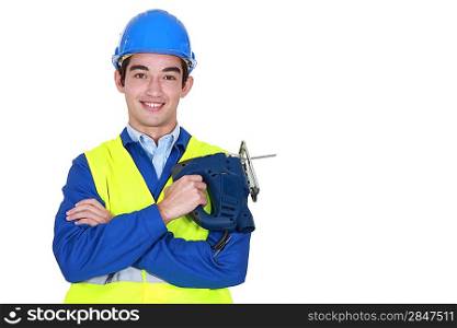 Young worker with band-saw