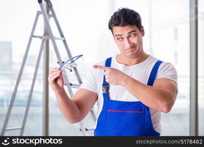 Young worker with safety goggles