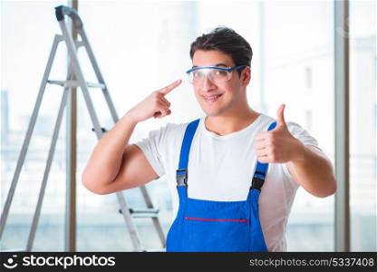 Young worker with safety goggles