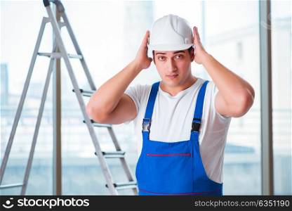 Young worker with safety helmet hardhat