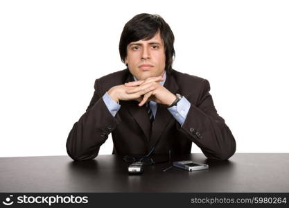 young worried business man, on a desk