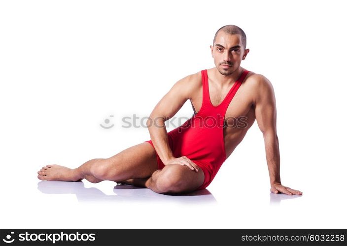 Young wrestler isolated on the white