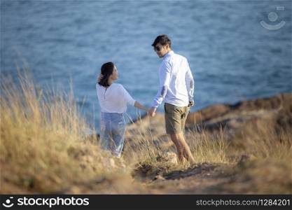 younger couples relaxing happiness emotion at vacation seaside
