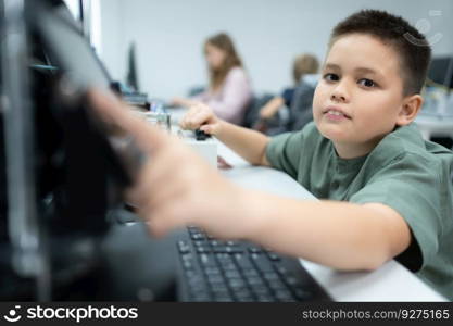 Youngsters utilizing the hand robot technology are having fun learning the electronic circuit board and hand robot controller of robot technology, which is one of the STEM courses.