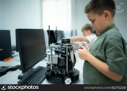 Youngsters utilizing the hand robot technology are having fun learning the hand robot controller of robot technology, which is one of the STEM courses.