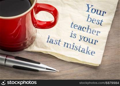 Your best teacher is your last mistake - handwriting on a napkin with a cup of coffee
