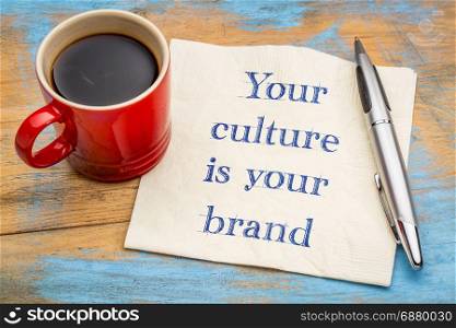 Your culture is your brand - handwriting on a napkin with a cup of coffee