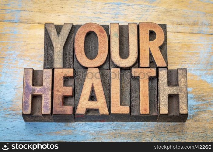 your health - word abstract in vintage letterpress wood type