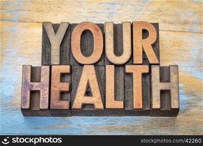 your health - word abstract in vintage letterpress wood type