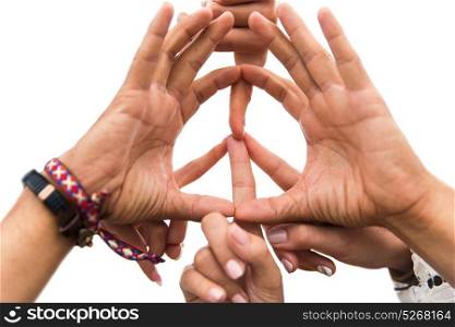 youth culture, gesture and people concept - close up of hippie friends showing peace hand sign outdoors. hands of hippie friends showing peace sign