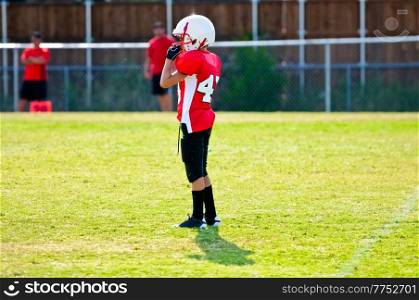 Youth football player on the field