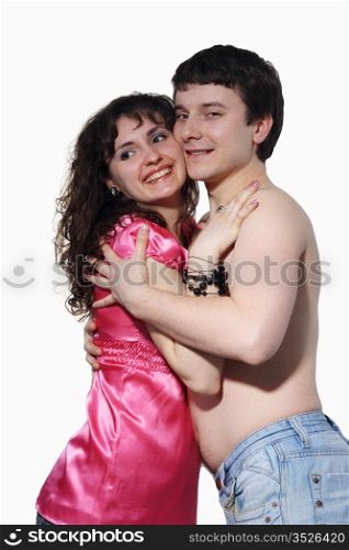 Youths fellow with a girl hug on the white background