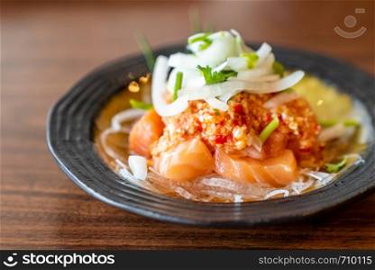 yum spicy salmon salad in Thai Style cuisine