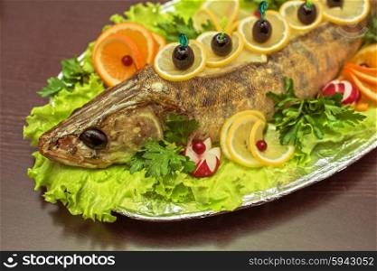 zander fish baked. zander fish baked with greens fruits and vegetables