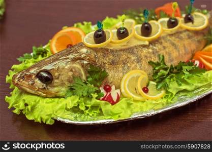 zander fish. zander fish baked with greens fruits and vegetables