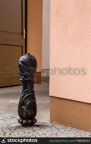 Zehdenick, Oberhavel, state Brandenburg, Germany - wooden pawn in front of a doorway