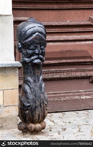 Zehdenick, Oberhavel, state Brandenburg, Germany - wooden pawn in front of a doorway