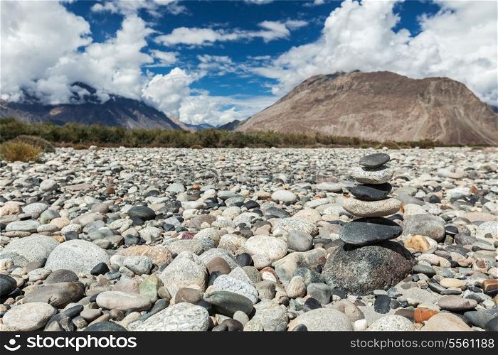 Zen balanced stones stack in Himalayas mountains. Nubra valley, Ladakh, Jammu and Kashmir, India
