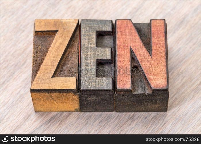 zen - word abstract in vintage wooden letterpress printing blocks stained by color inks