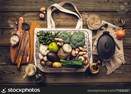 Zero waste Plastic free Vegan Vegetarian cooking on wooden table background, flat lay