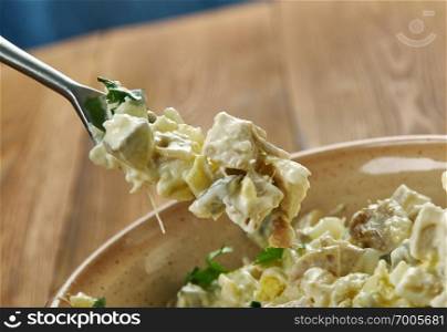 Zesty Chicken Salad Spread or appetizers or sandwiches using canned chicken, cream cheese, and ranch dressing.