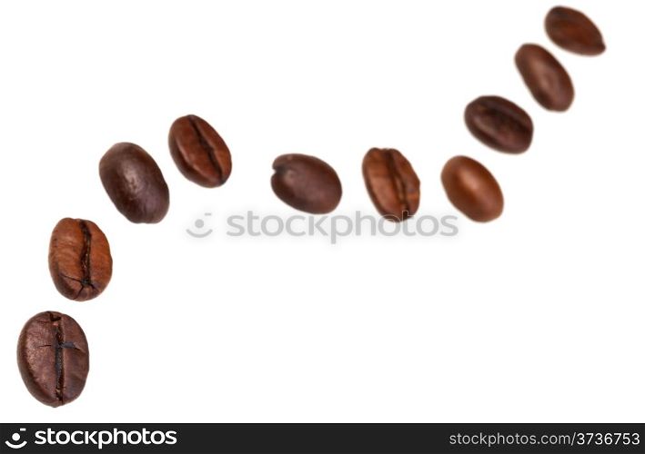 zigzag pattern from many roasted coffee beans with focus foreground