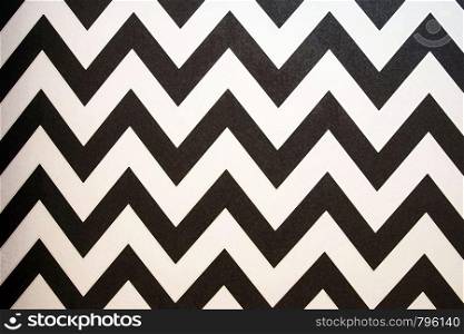 Zigzag Striped seamless pattern with horizontal line. Black and white fashion graphics design. Strict graphic background. Retro style. Template for wallpaper, wrapping, textile, fabric. Background texture. Zigzag Striped seamless pattern background. Retro style. Template for wallpaper, wrapping, textile, fabric. Background texture black and white