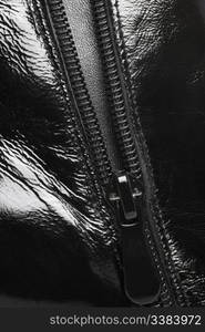 Zipper. A leather product, a photo close up. Zipper