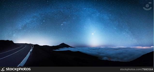 Zodiacal Light over Mount Teide cloudscape in Tenerife with Venus to the centre of the light