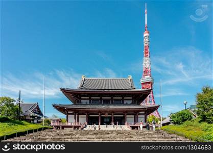 Zojo-ji Temple and Tokyo Tower in Tokyo, Japan. It is the main temple of the Jodo-shu Chinzei sect of Buddhism in the Kanto region.