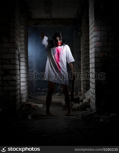 Zombie girl in old dirty house