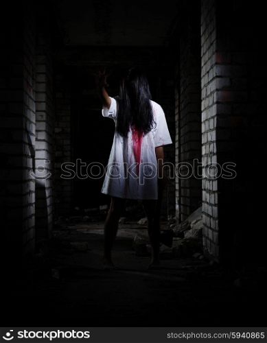 Zombie girl in old house